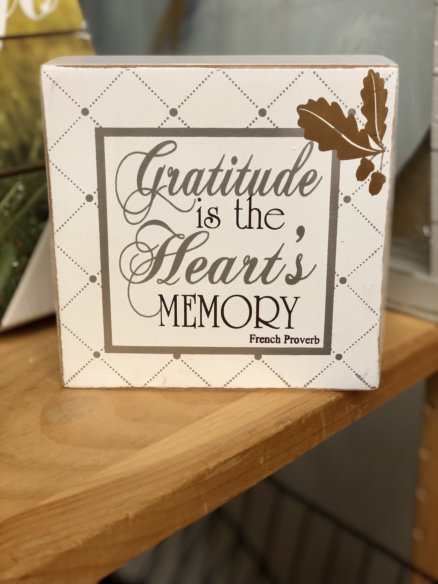 The Power of Gratitude: A small frame with words of gratitude.